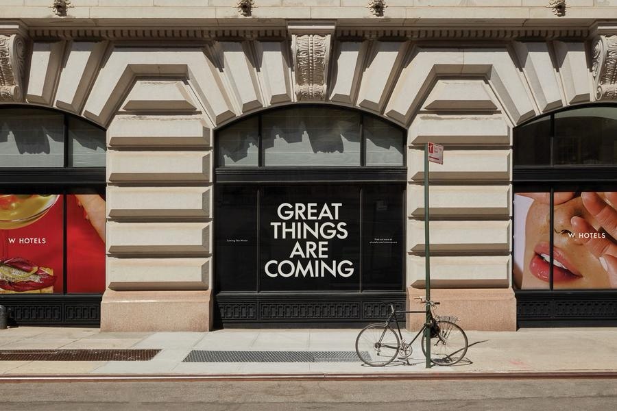 W Hotels storefront window takeover reading Great Things Are Coming